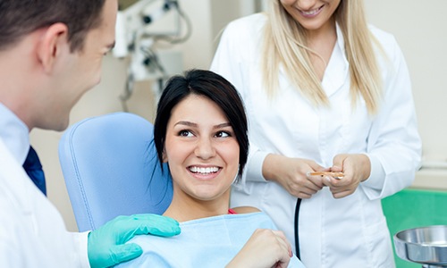 Smiling woman in dental chair