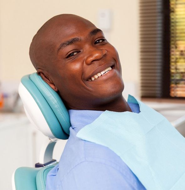 Man visiting his Braintree dentist for checkup and cleaning