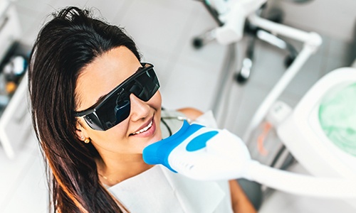 Woman receiving dental treatment