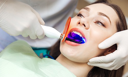 Patient receiving cosmetic dental care
