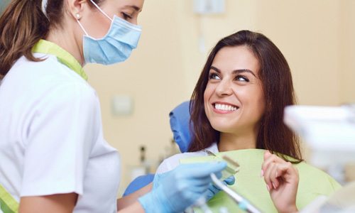 Woman smiling at Braintree dentist