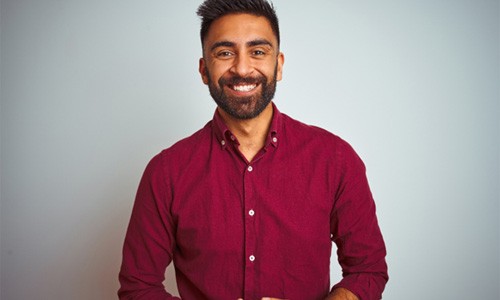 Closeup of man with dental crown in Braintree smiling