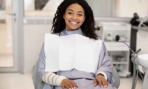 Woman with dentures in Braintree smiling