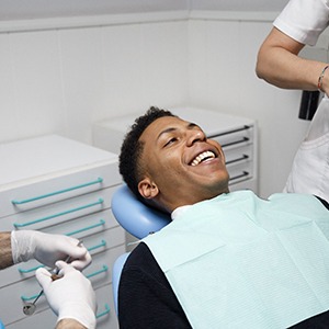 Patient smiling while visiting emergency dentist in Braintree