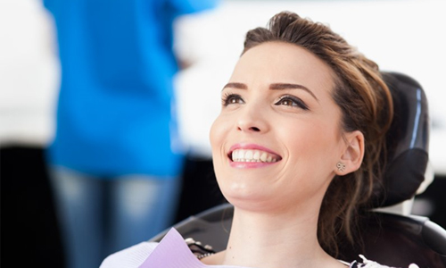 woman smiling in dental chair 