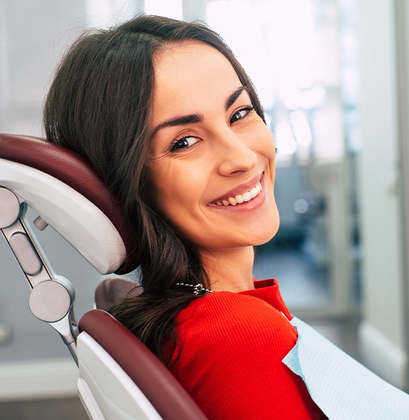 Smiling woman in dental chair