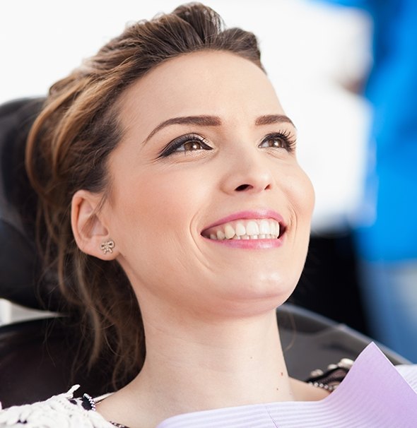 Smiling woman in dental chair