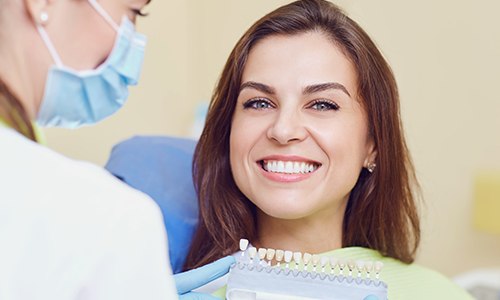 Smiling woman in dental chair