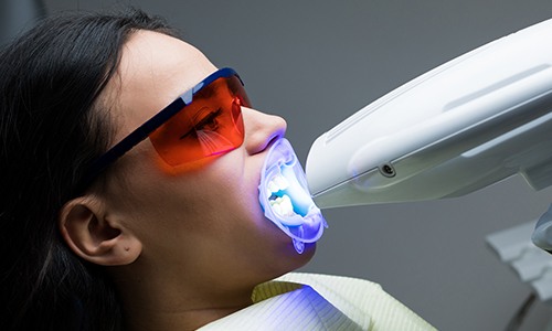 Patient receiving teeth whitening treatment
