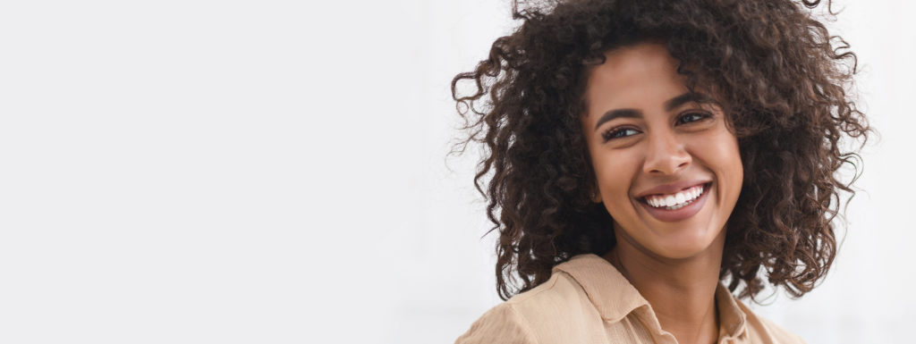 attractive young woman curly hair